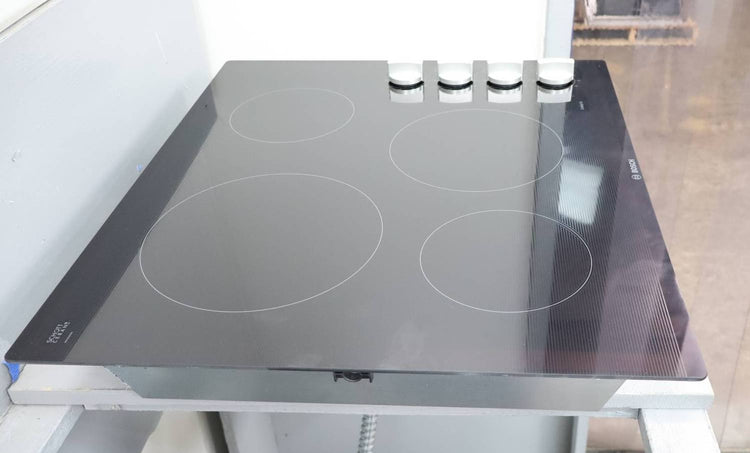 Bosch 500 Series 24" Infinite Temp Control BlackGlass Electric Cooktop NEM5466UC