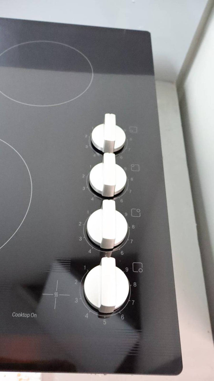 Bosch 500 Series 24" Infinite Temp Control BlackGlass Electric Cooktop NEM5466UC