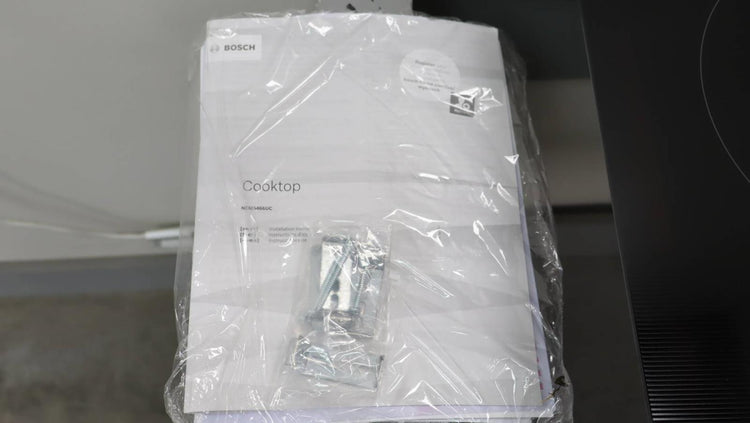 Bosch 24" Infinite Temp Control BlackGlass 500 Series Electric Cooktop NEM5466UC