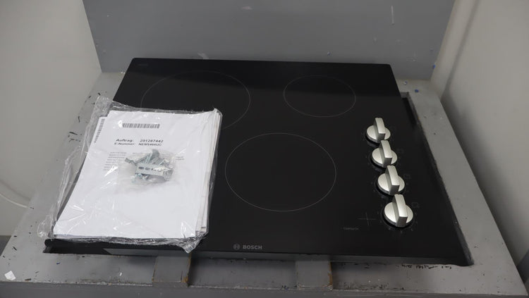 Bosch 24" 500 Series Infinite Temp Control Blk Glass Electric Cooktop NEM5466UC - Alabama Appliance