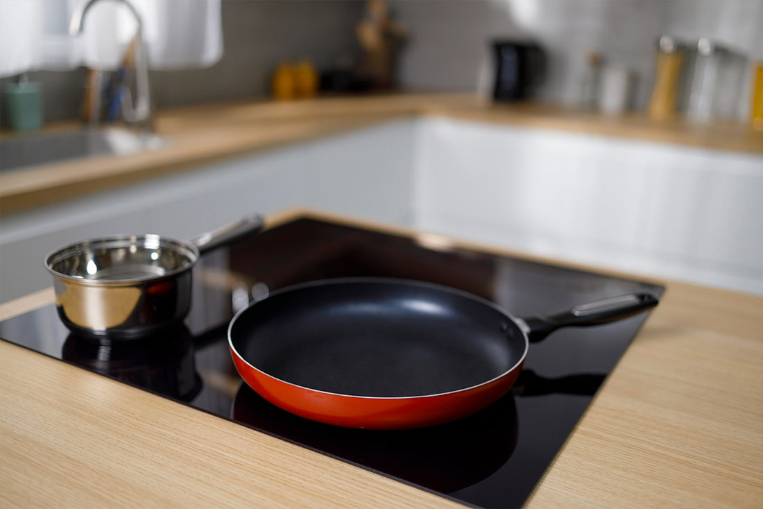 How do induction hobs compare to gas and electric cooking hobs?