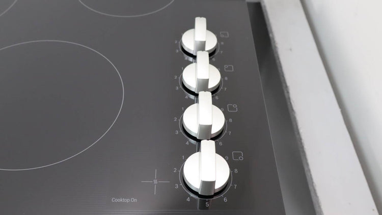 Bosch 24" Infinite Temp Control BlackGlass 500 Series Electric Cooktop NEM5466UC