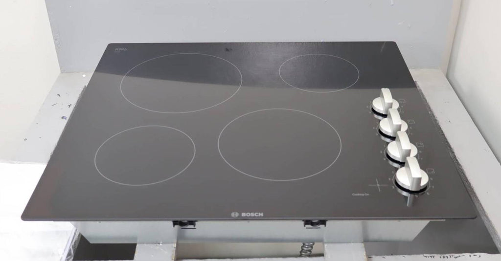 Bosch 24" Infinite Temp Control BlackGlass 500 Series Electric Cooktop NEM5466UC