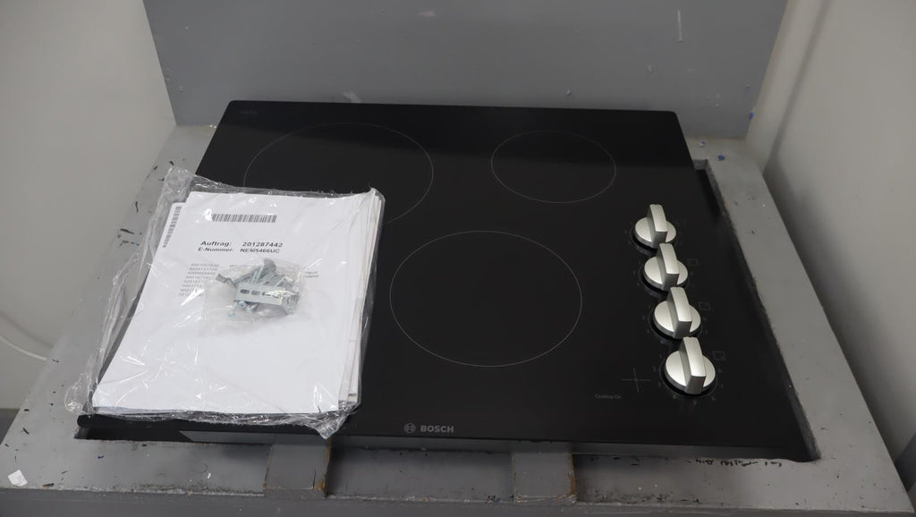 Bosch 24" 500 Series Infinite Temp Control Blk Glass Electric Cooktop NEM5466UC - Alabama Appliance
