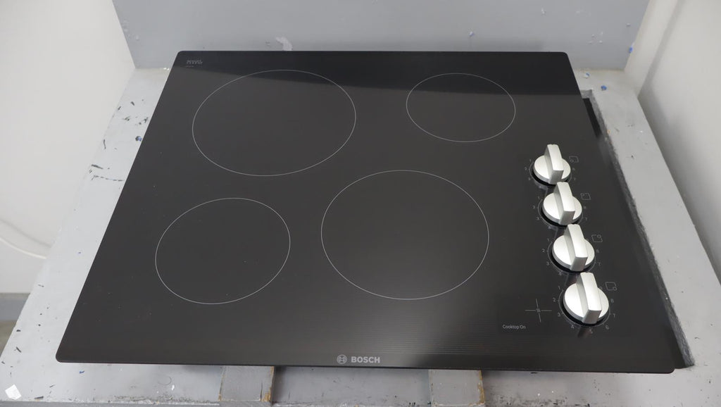 Bosch 24" 500 Series Infinite Temp Control Blk Glass Electric Cooktop NEM5466UC - Alabama Appliance
