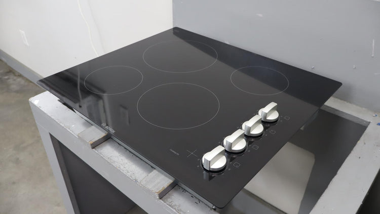 Bosch 24" 500 Series Infinite Temp Control Blk Glass Electric Cooktop NEM5466UC - Alabama Appliance
